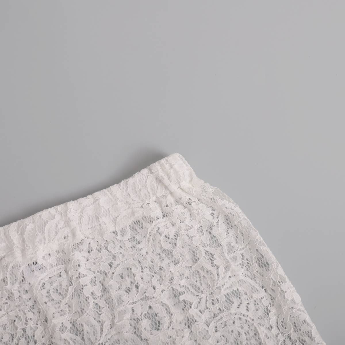 Lace skirt with jacquard cutout slit at the back