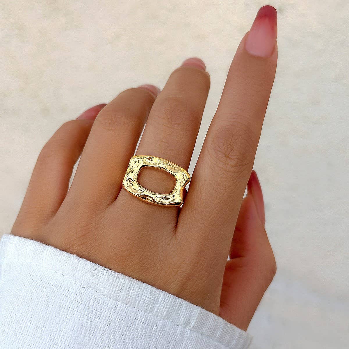 SIMPLE ASYMMETRICAL STATEMENT FRENCH RING