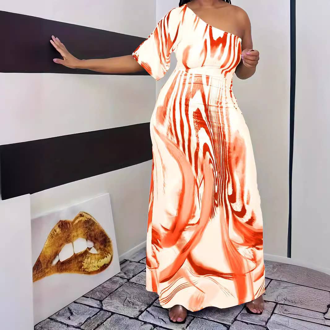 PRINTED ONE-SLEEVED DRESS WITH SLOPING SHOULDERS