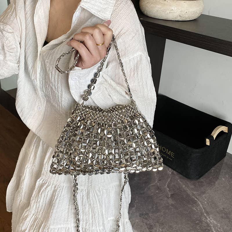 Fashionable hollowed-out glossy crossbody bag