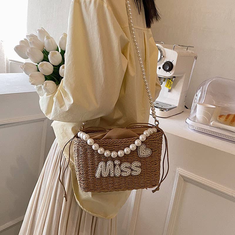 Single-shoulder pearl hand-held woven bag