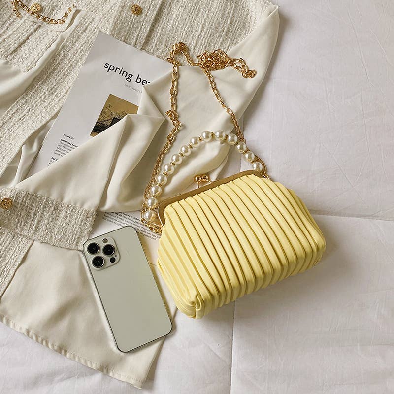 Pearl shell bag diagonally across the body