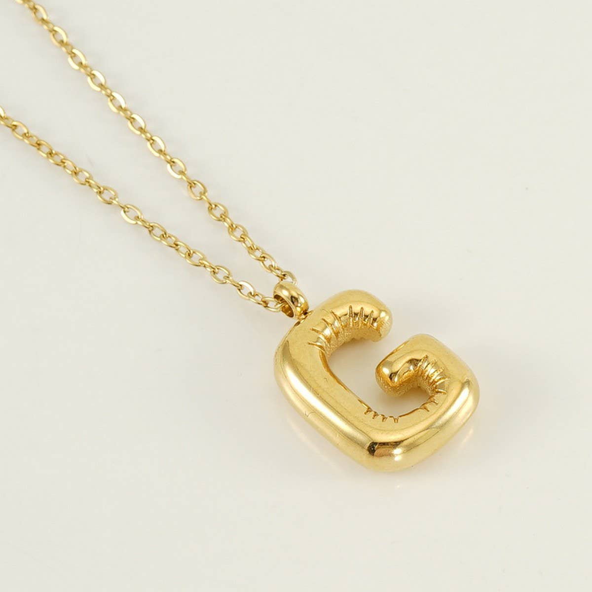 CWAJE1933_Stainless Steel Glossy Bubble Letter Necklace Gold