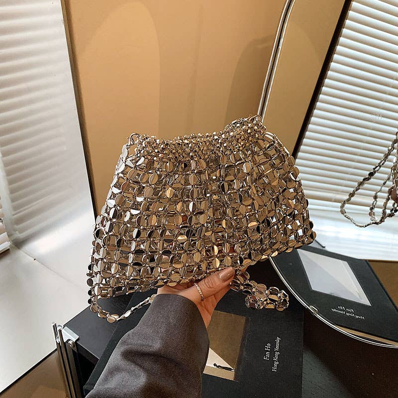 Fashionable hollowed-out glossy crossbody bag