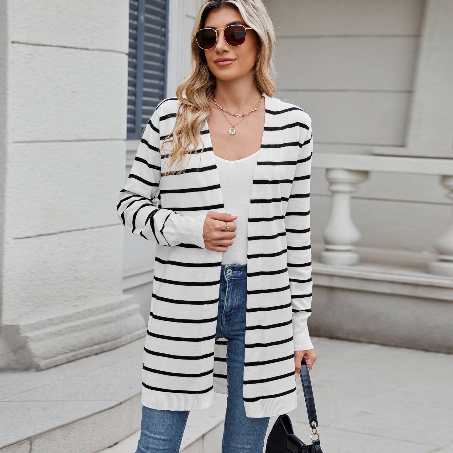Long knitted striped cardigan without buttons