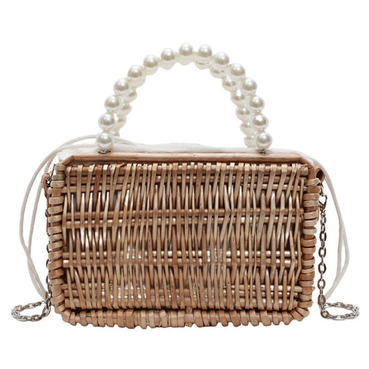 Fashionable perforated beach basket bag