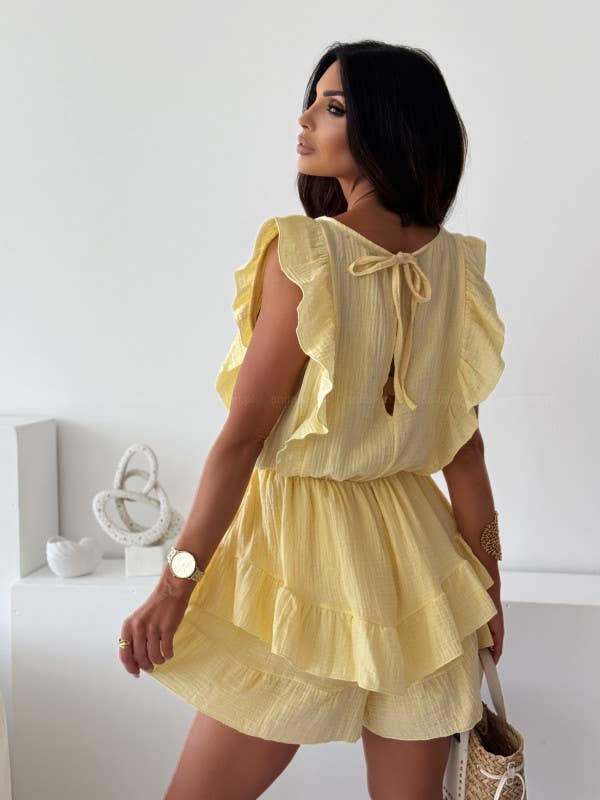 Solid-color waist-cinched ruffled jumpsuit