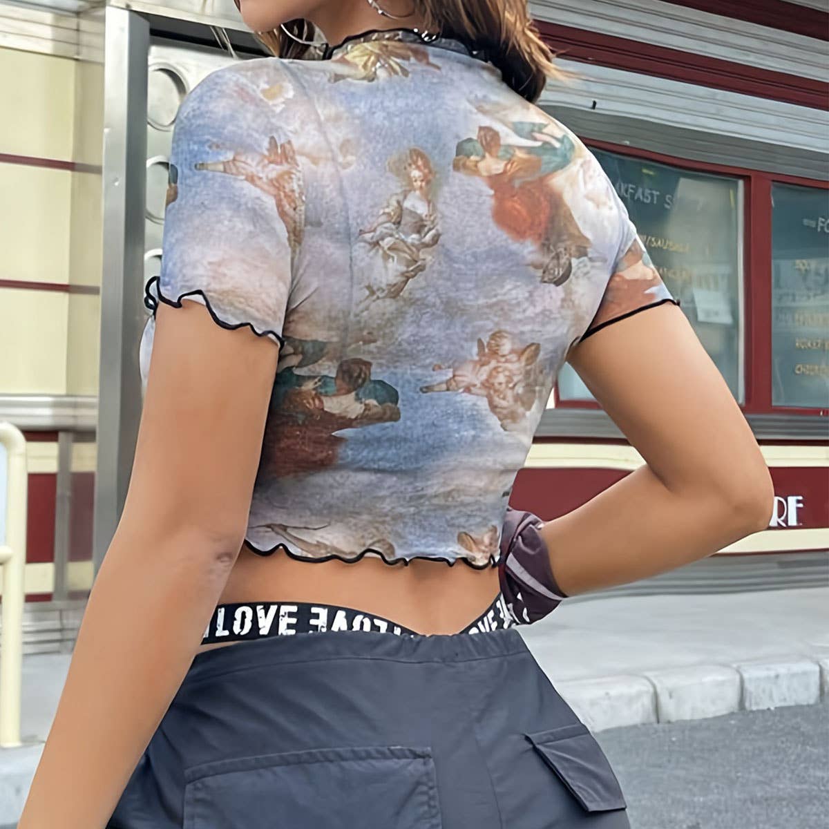 FLORAL PRINT MESH TOP WITH RUFFLE DETAILING