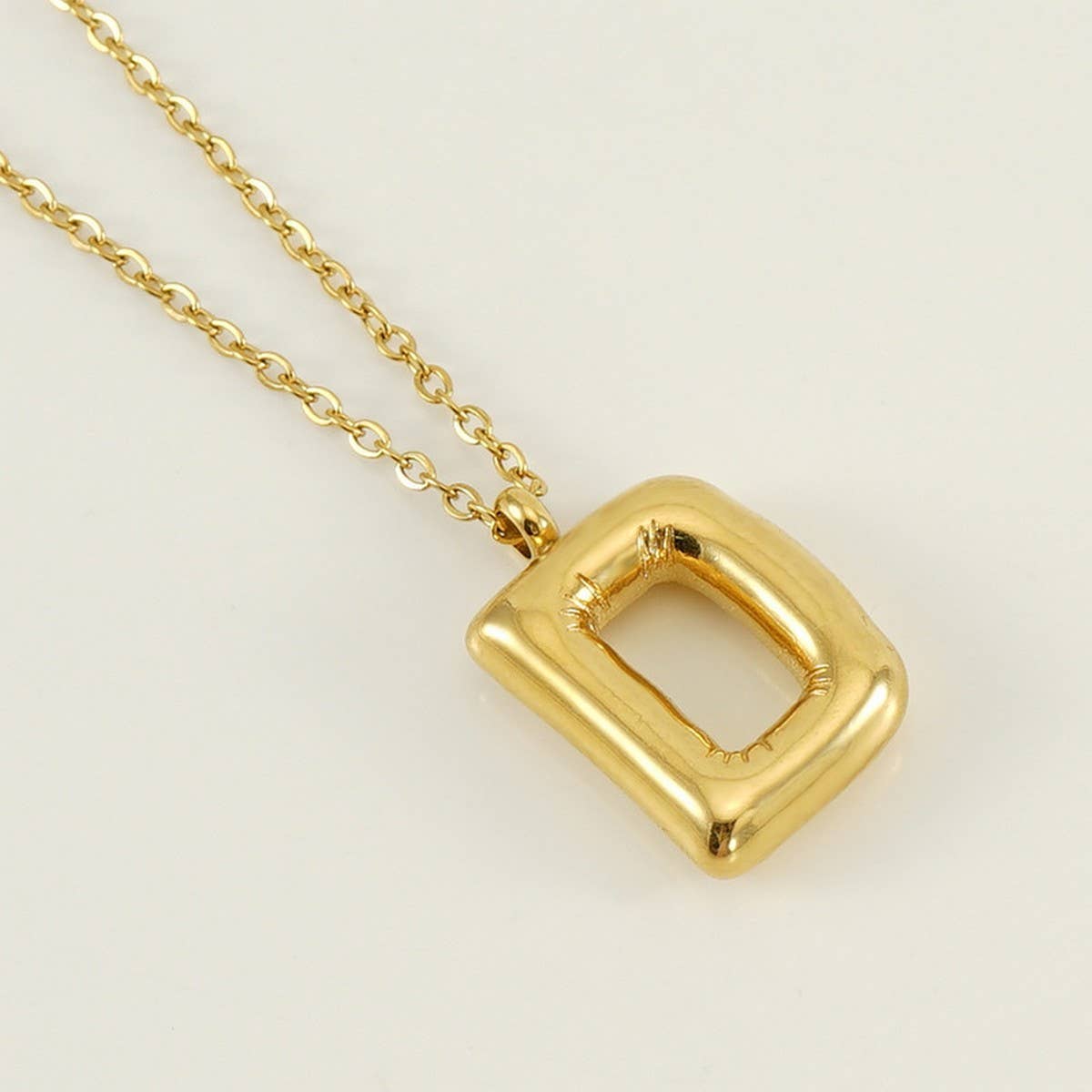 CWAJE1933_Stainless Steel Glossy Bubble Letter Necklace Gold
