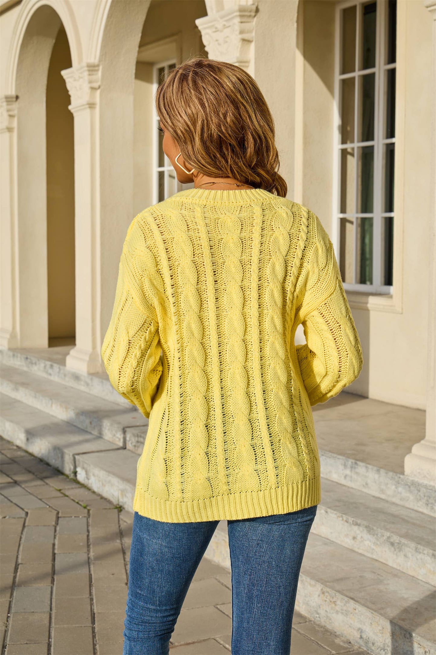 Solid-colored twisted round-neck loose sweater