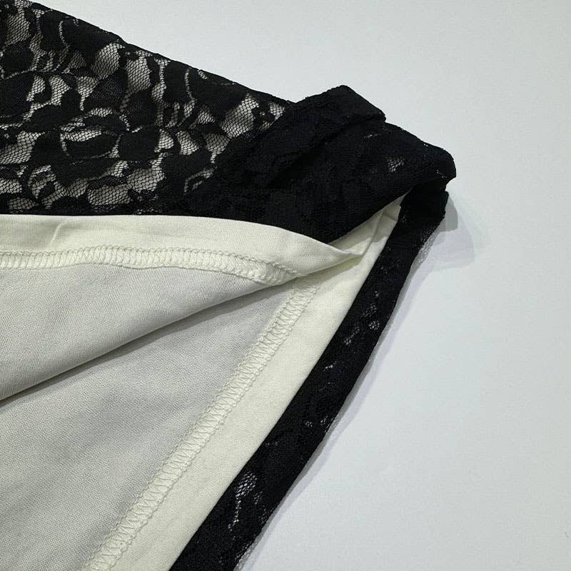 A strappy deep V lace see-through dress