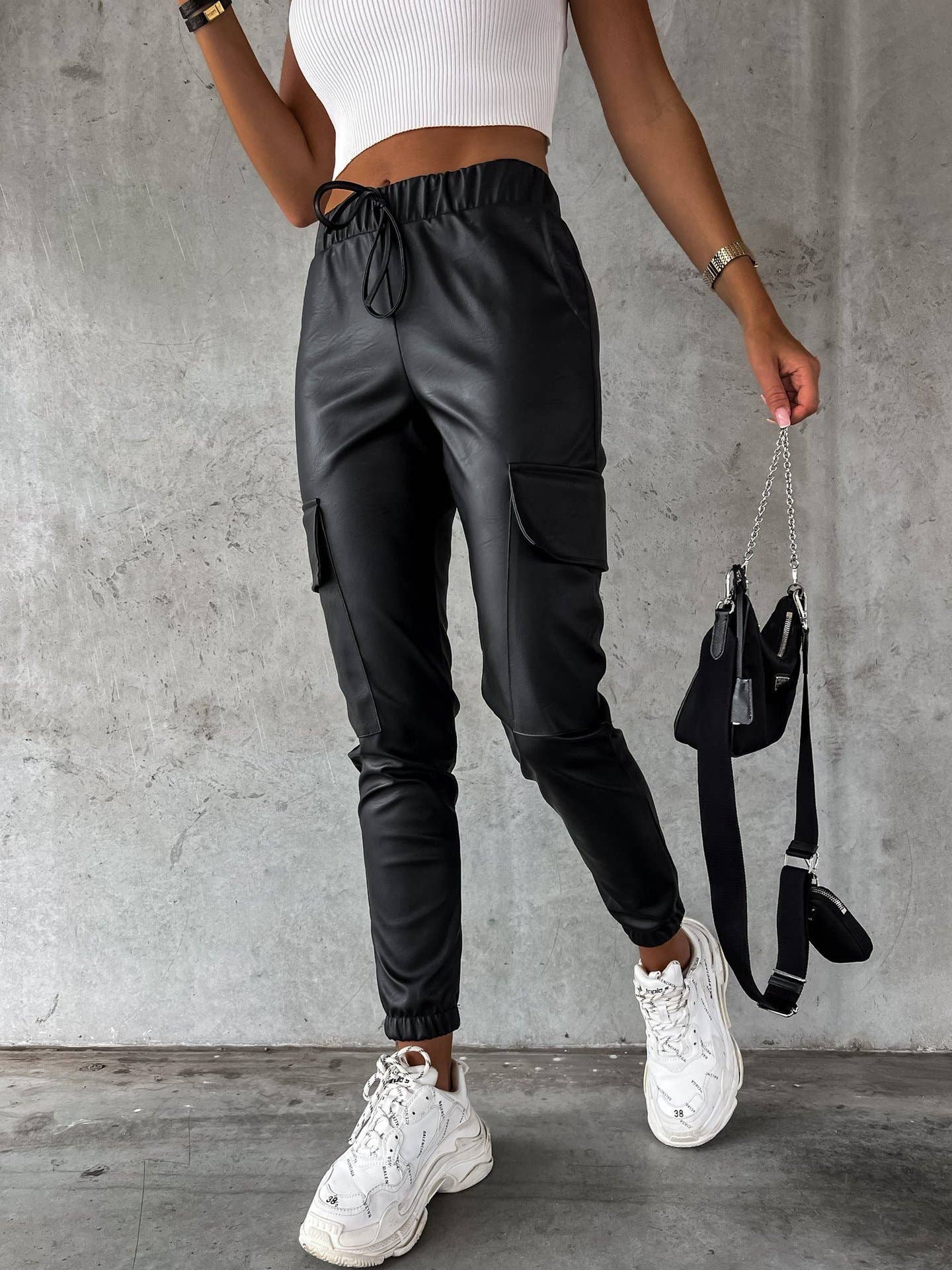 Waist-cinching street drawstring leather pants
