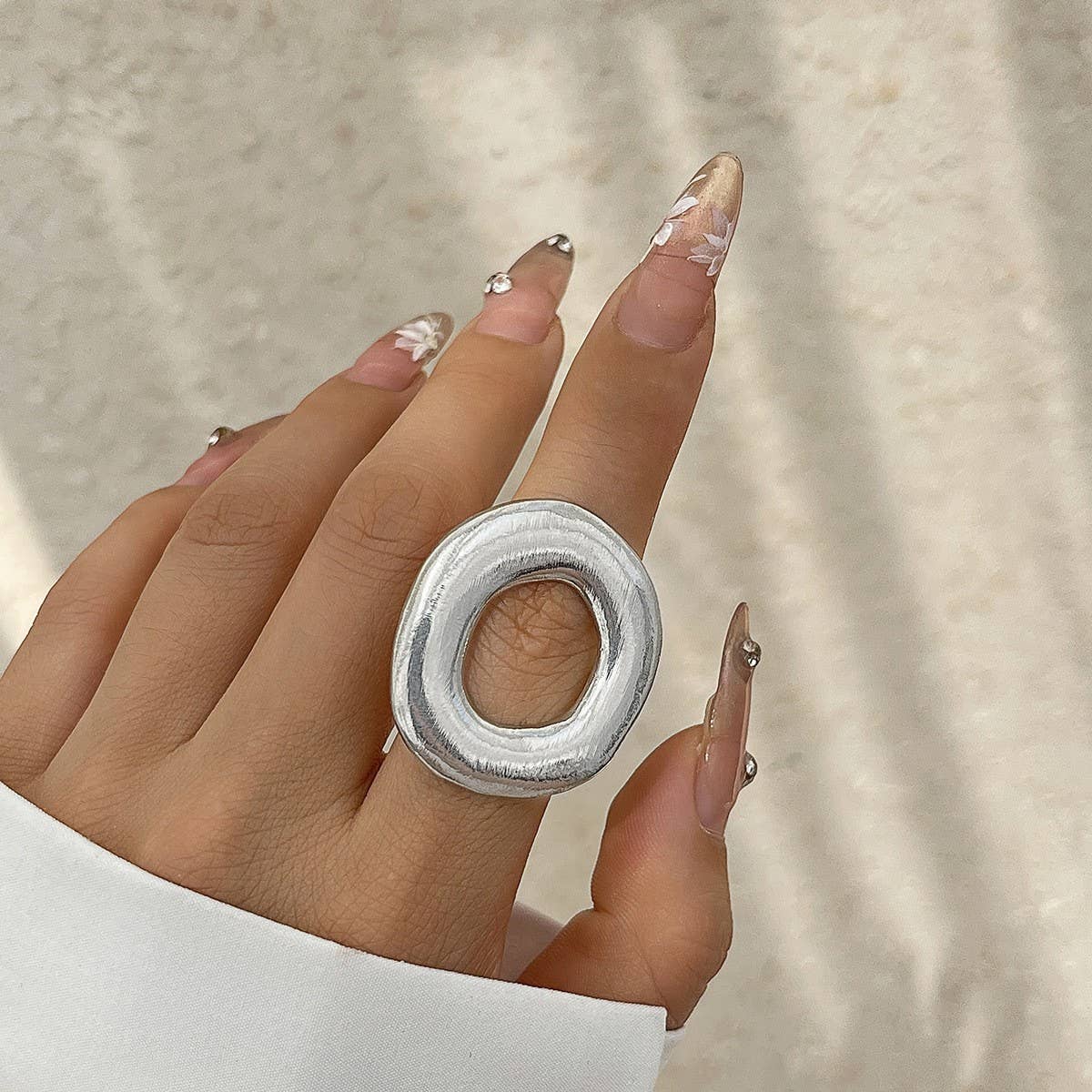 FASHIONABLE METAL IRREGULAR WATER DROP OPEN RING