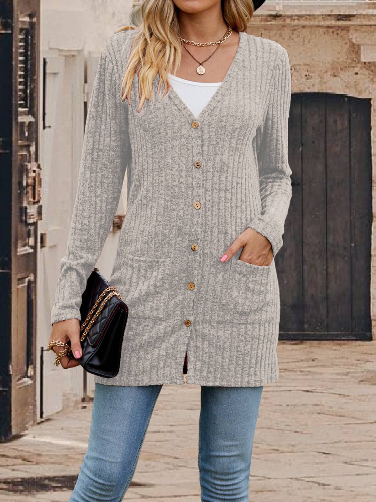 Single - buttoned V-neck pit strip cardigan