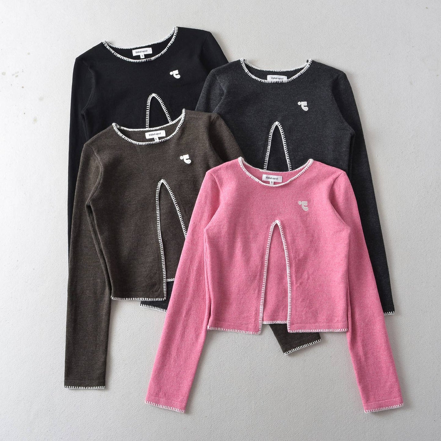 HOTTIE FOLDS IN A SLIM-FIT SHORT SWEATER