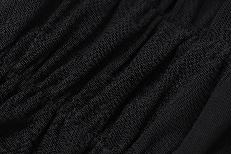 Solid-color backless, lace-up halter top