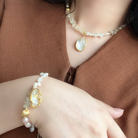 GLITTERING WAVE-SHAPED NATURAL PEARL SET