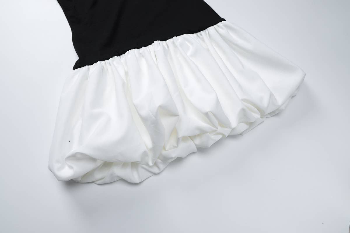 A one-shoulder patchwork short puffy dress