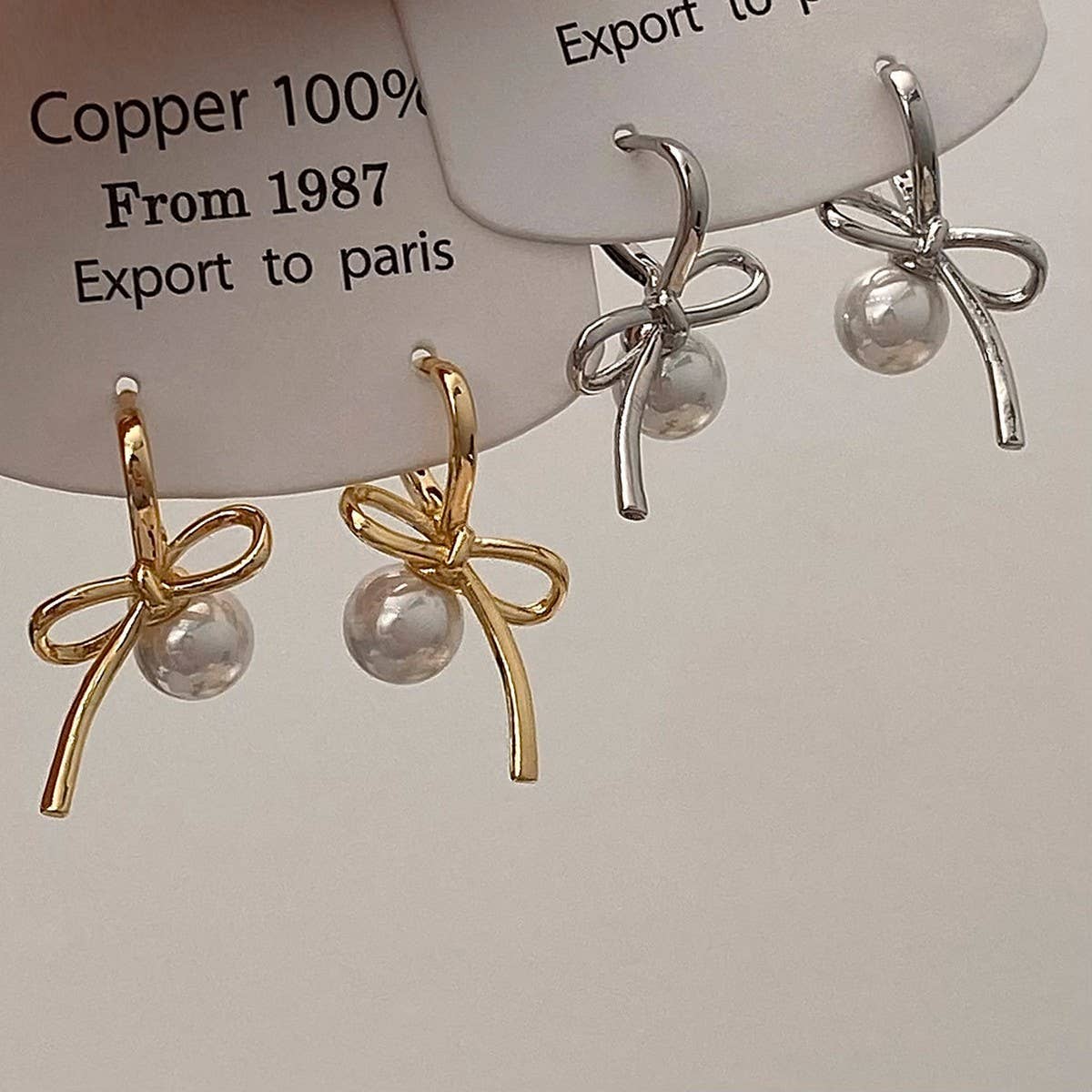 SIMPLE AND HIGH-END PEARL PENDANT BOW EARRINGS