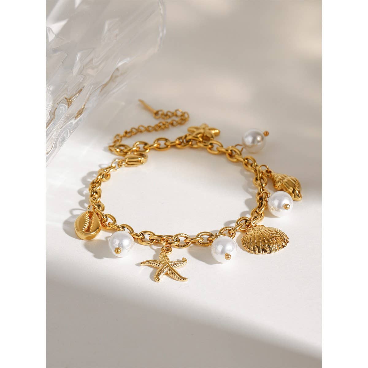 18K Gold Sea Charm Bracelet in Stainless Steel_CWAJE4641