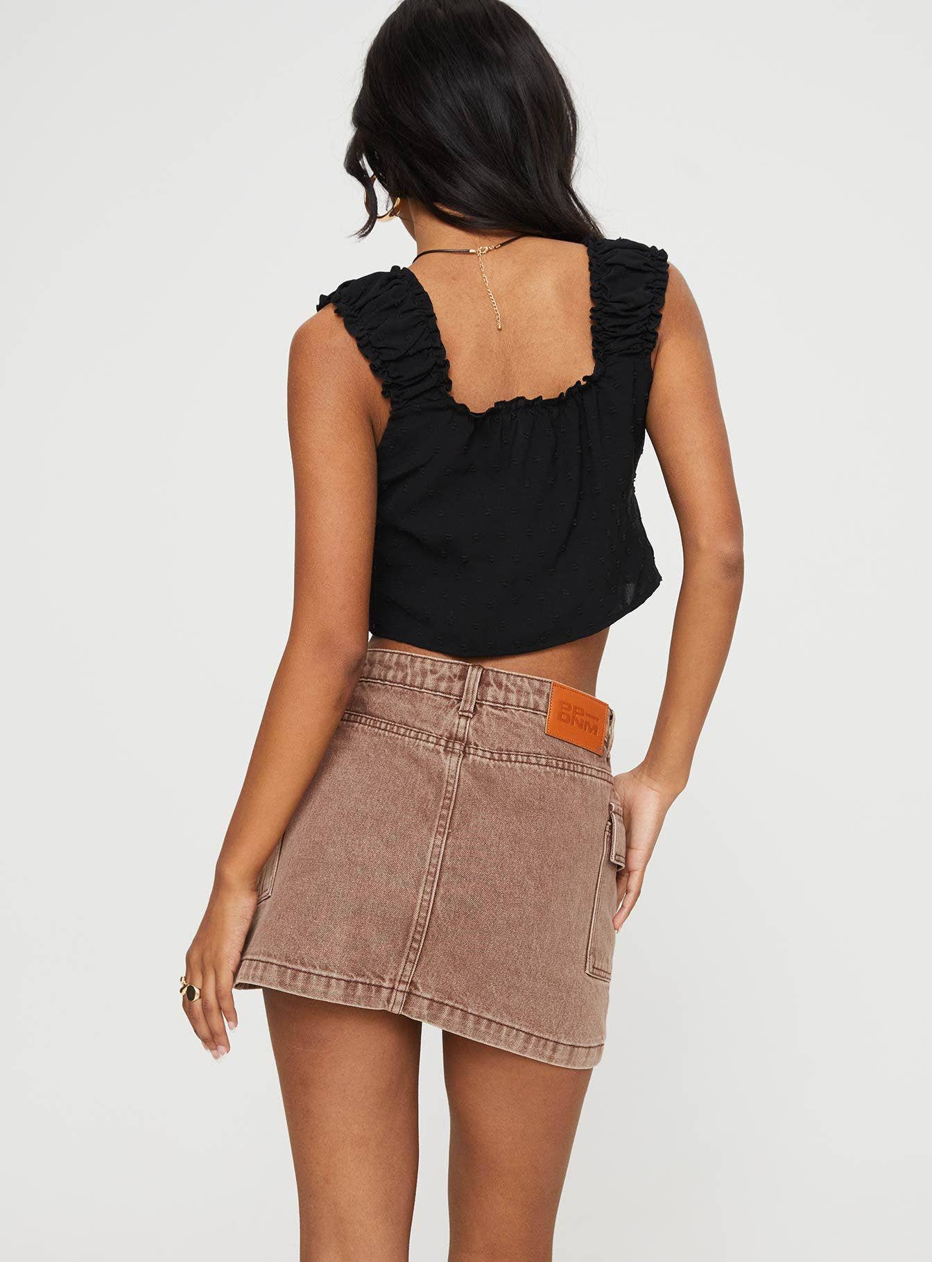 Washed denim mini skirt with elegant temperament