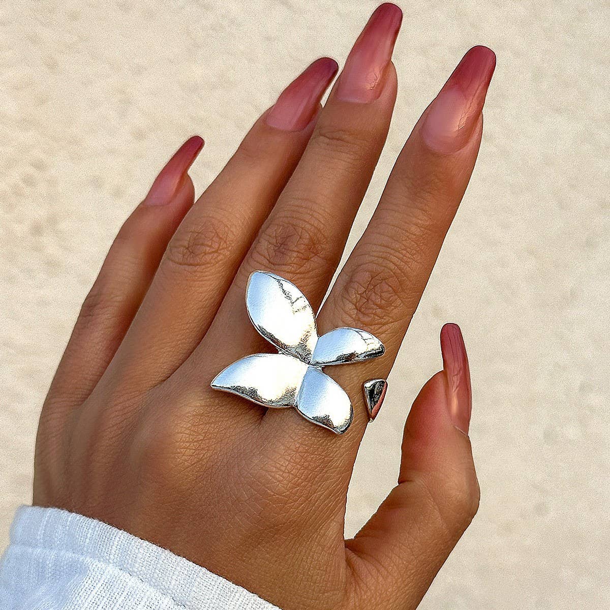 SIMPLE ASYMMETRICAL STATEMENT FRENCH RING