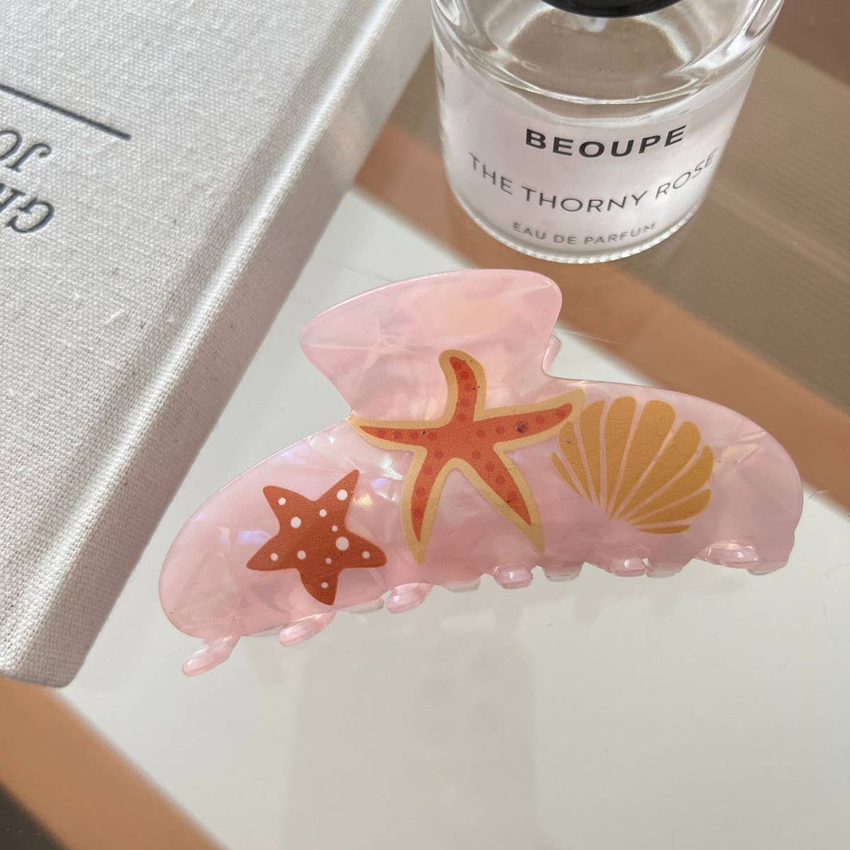 CWAHA07745_ACETATE STARFISH OCEAN SHARK HAIR CLAW CLIP