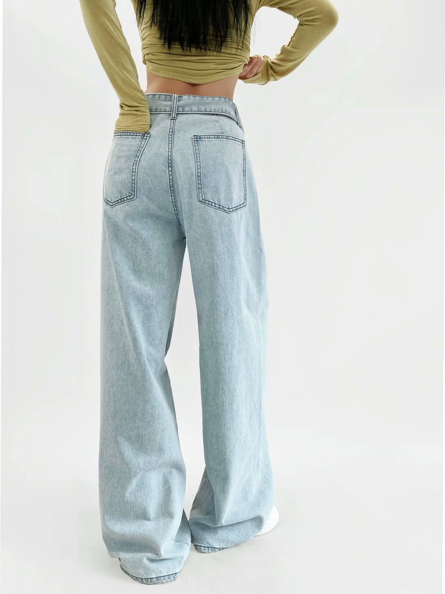 High street girls pair wide-leg jeans with belts