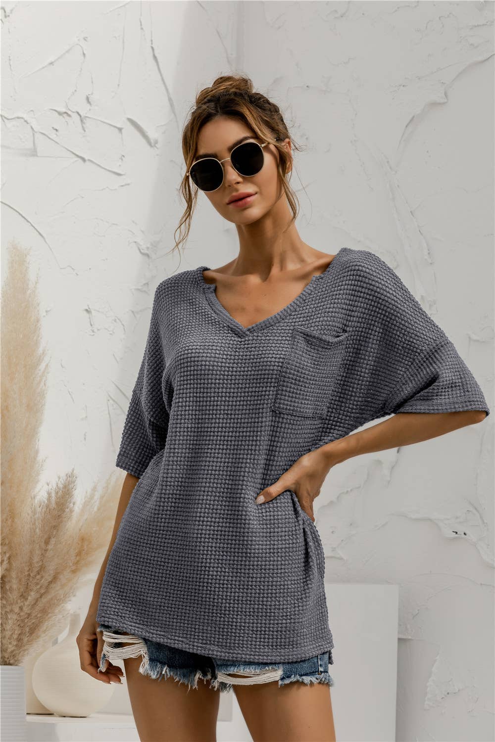 V-neck pocket slit solid-color knitted top
