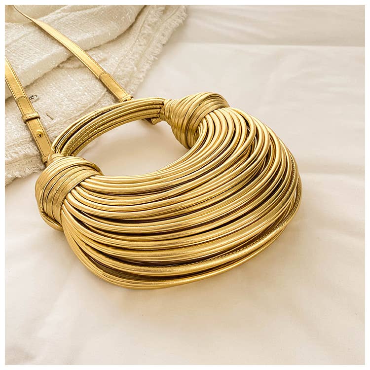 Metallic color striped appearance glossy handbag