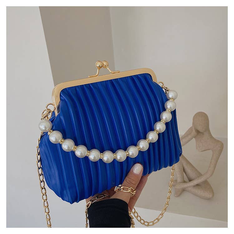 Pearl shell bag diagonally across the body