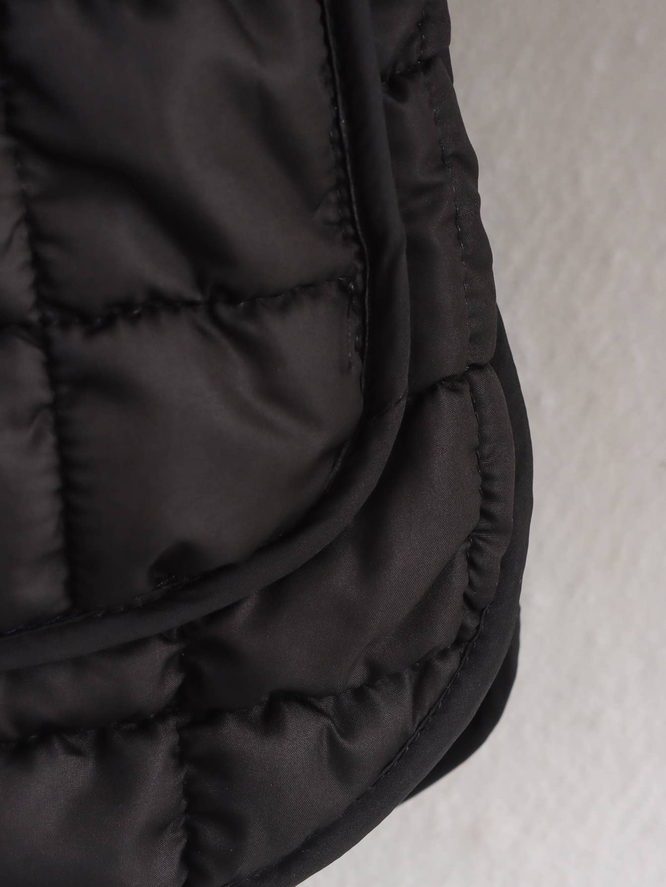 Short textured quilted three-dimensional coat