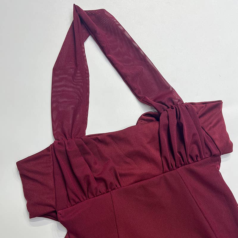 Long backless, cinched waist and neckline dress