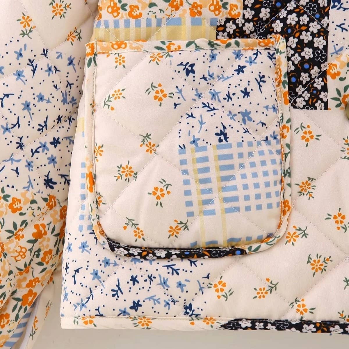 FLORAL PRINT PANELED BUTTON QUILTED JACKET