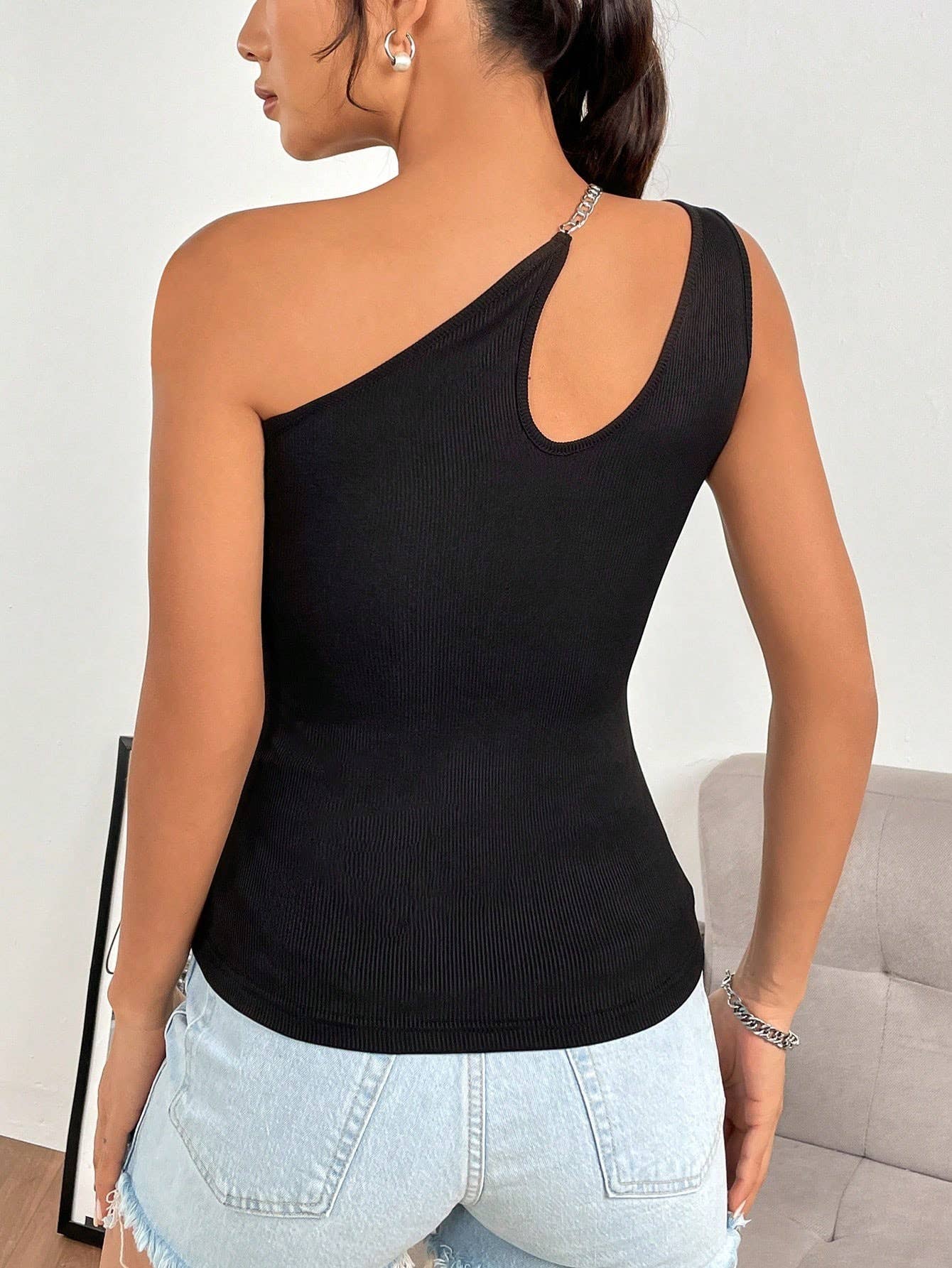 Sexy hollow out asymmetrical sleeveless top