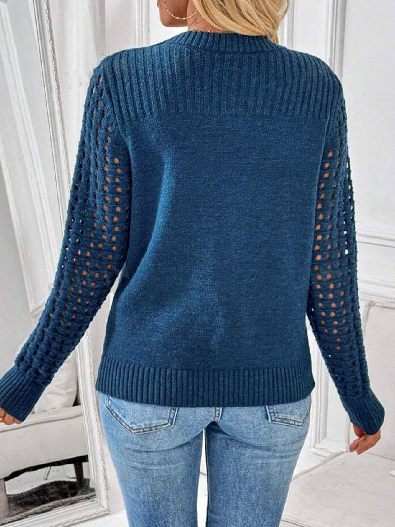 Solid-color cut-out round-neck knitted sweater