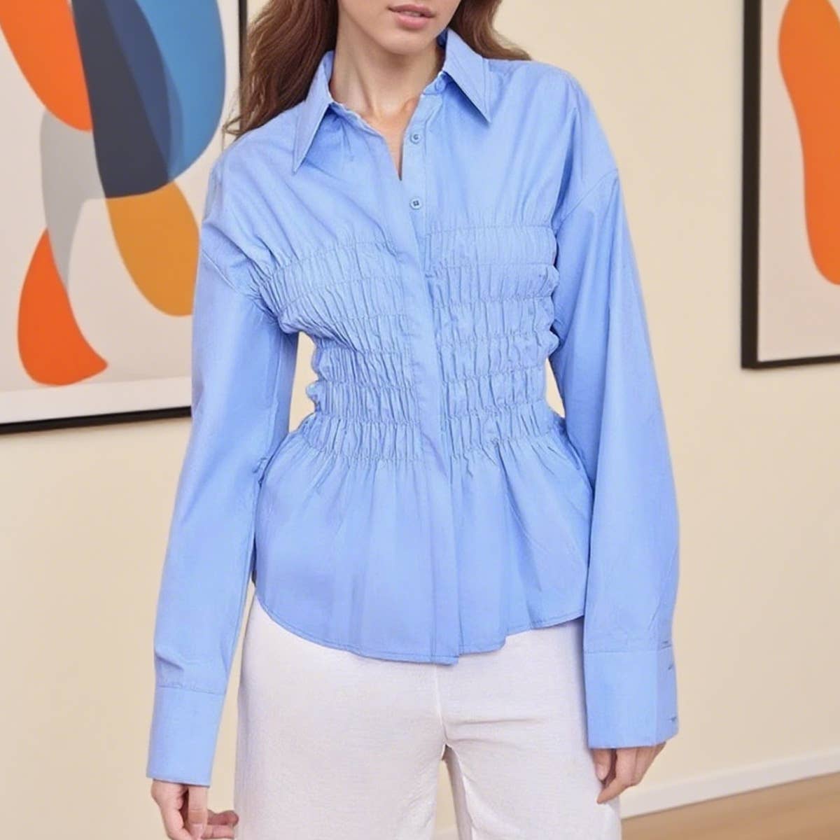 Lapel paired with a pleated cinched-waist shirt