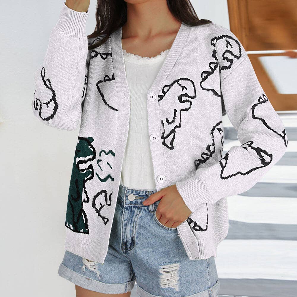 THE JACKET IS A LOOSE CARTOON DINOSAUR CARDIGAN