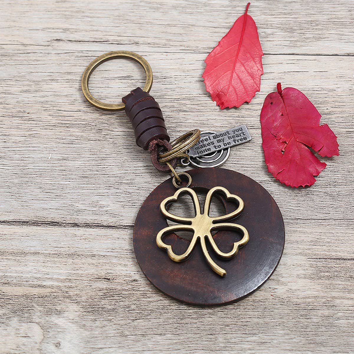 CREATIVE LOVE GRASS WOVEN LEATHER KEYCHAIN