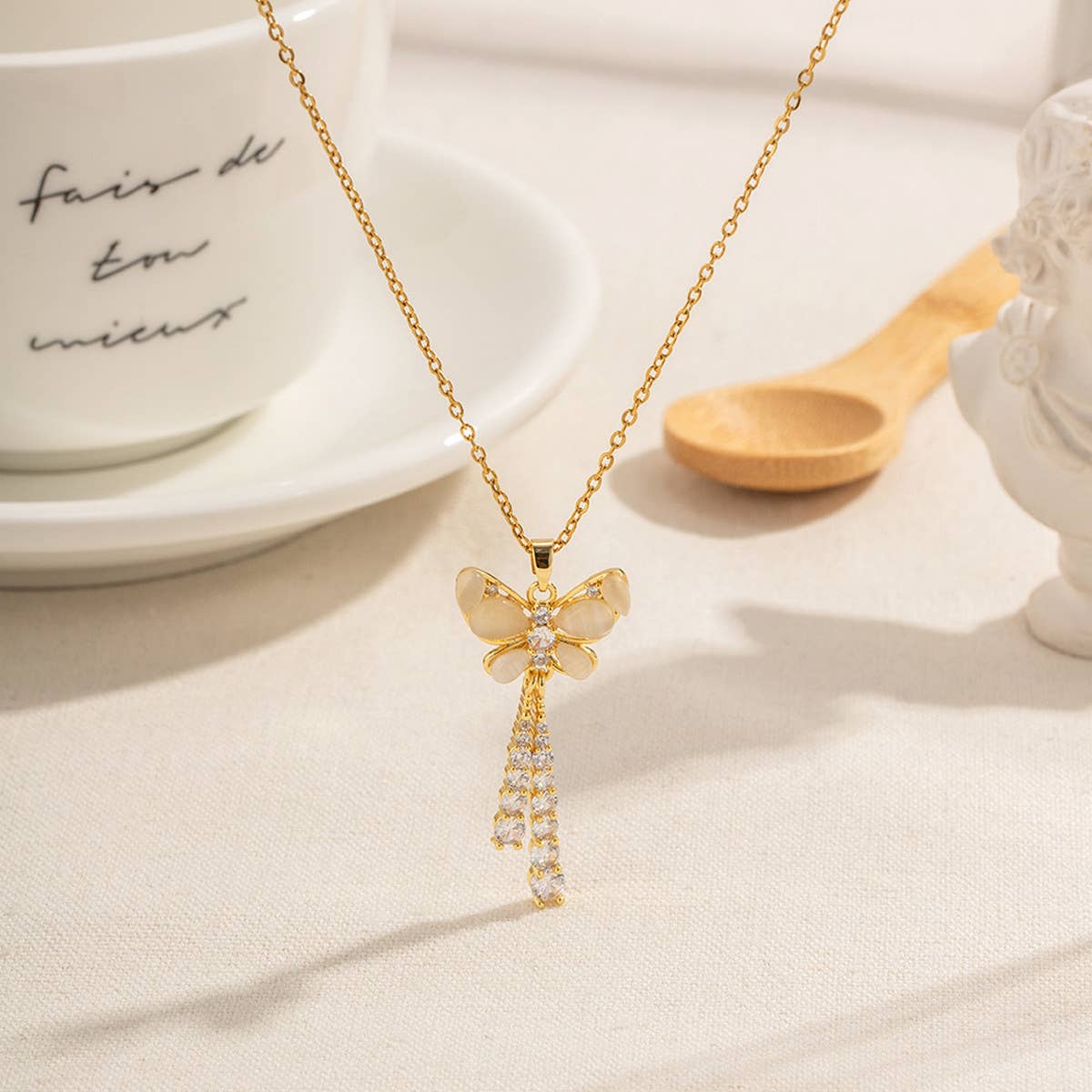 LILY OF THE VALLEY TASSEL BUTTERFLY NECKLACE_CWAHA0919