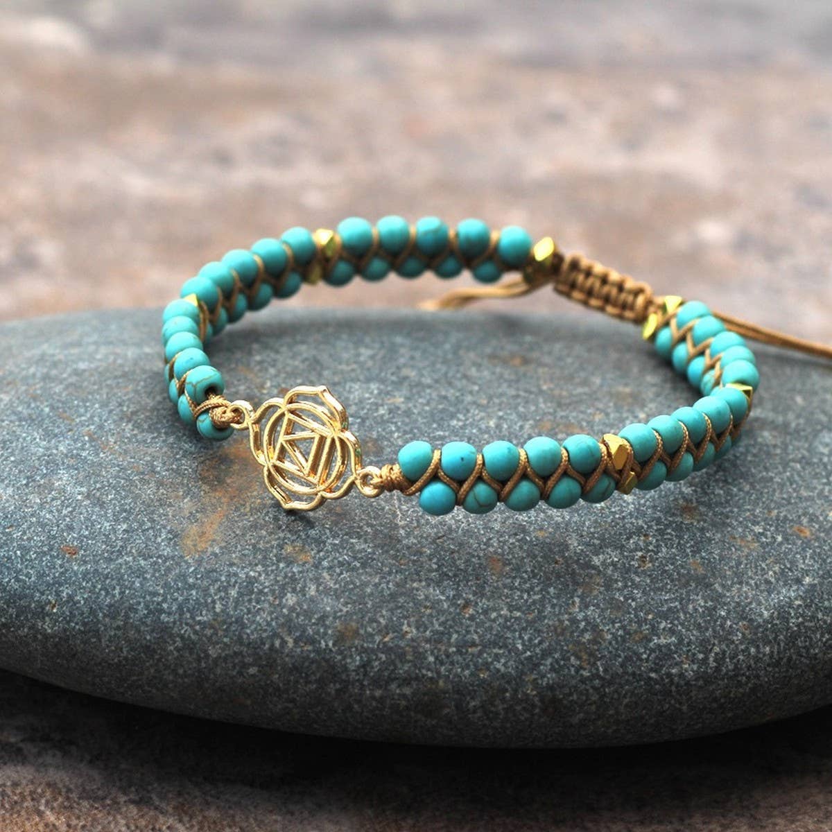 GOLD TONE REIKI SYMBOL YOGA BRAIDED BRACELET