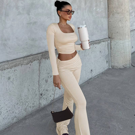 Long-sleeved top tight trousers and pleated suit