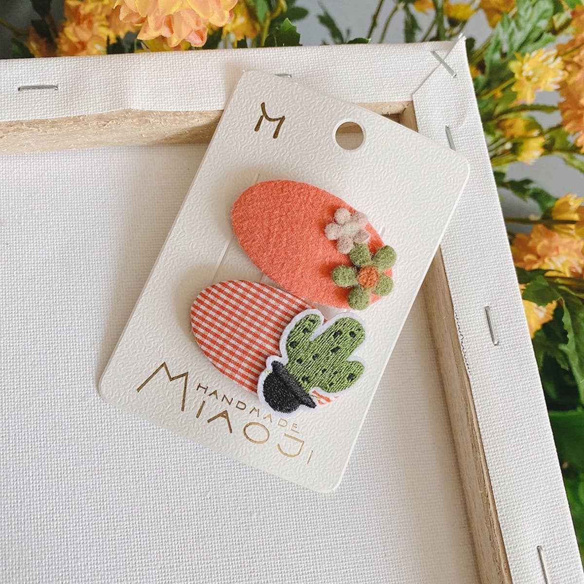 CHILDREN'S OVAL EMBROIDERED PATCH HAIRPIN