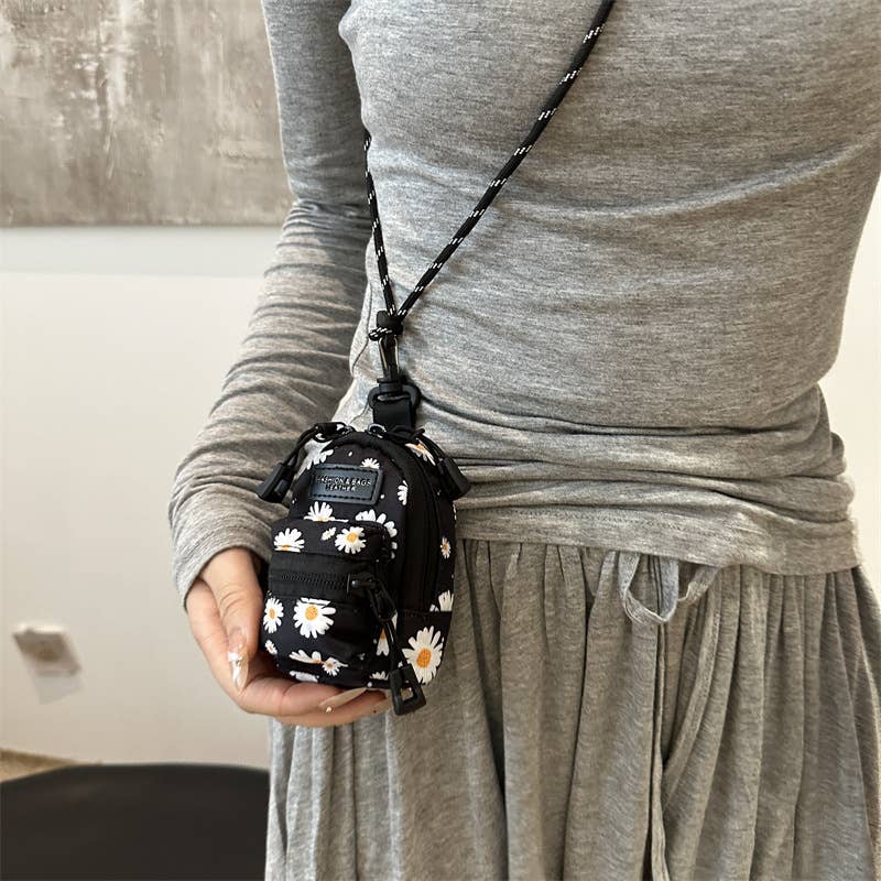 Printed mini lipstick headphones and small bag