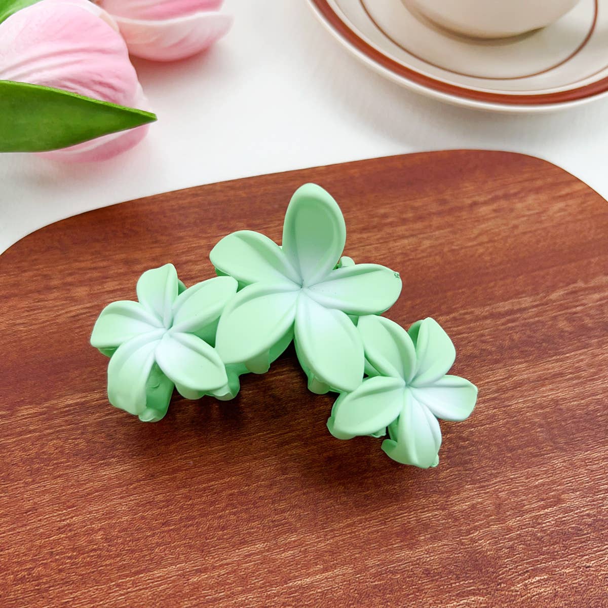 Candy-colored plastic hair clips with flowers
