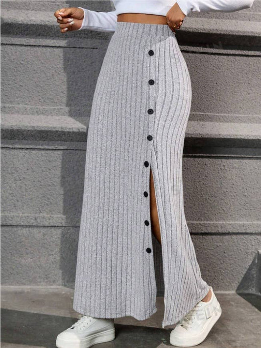 SLIT SLIT BUTTONS ADORN A DRAPED HIP SKIRT