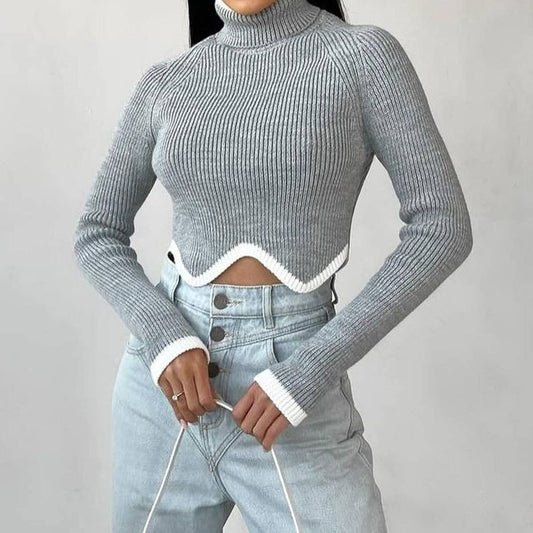 SHORT TIGHT TURTLENECK AND IRREGULAR HEM SWEATER