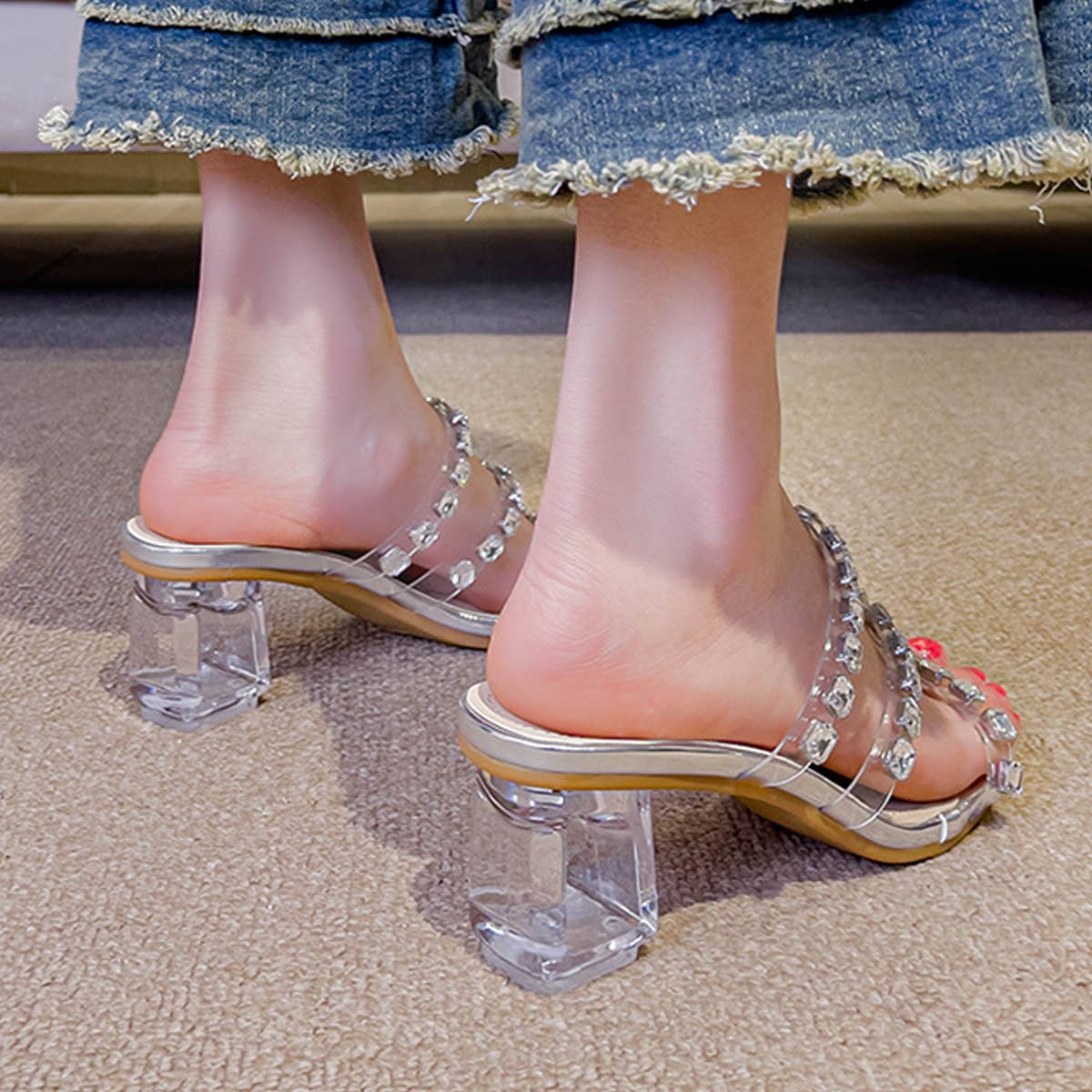 WEARING RHINESTONE STRAPPY HIGH HEELS