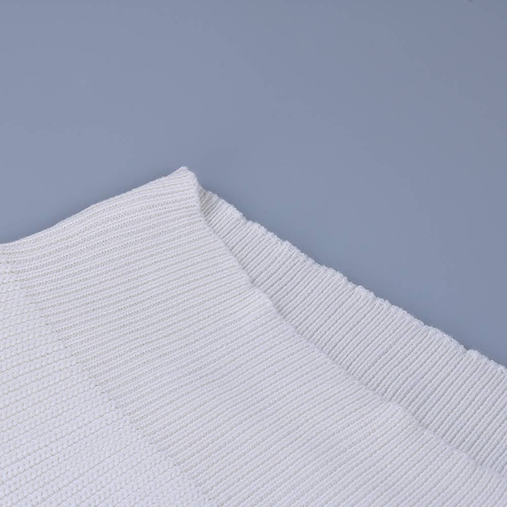 SOLID SLEEVELESS TURTLENECK SHOULDER PAD SWEATER