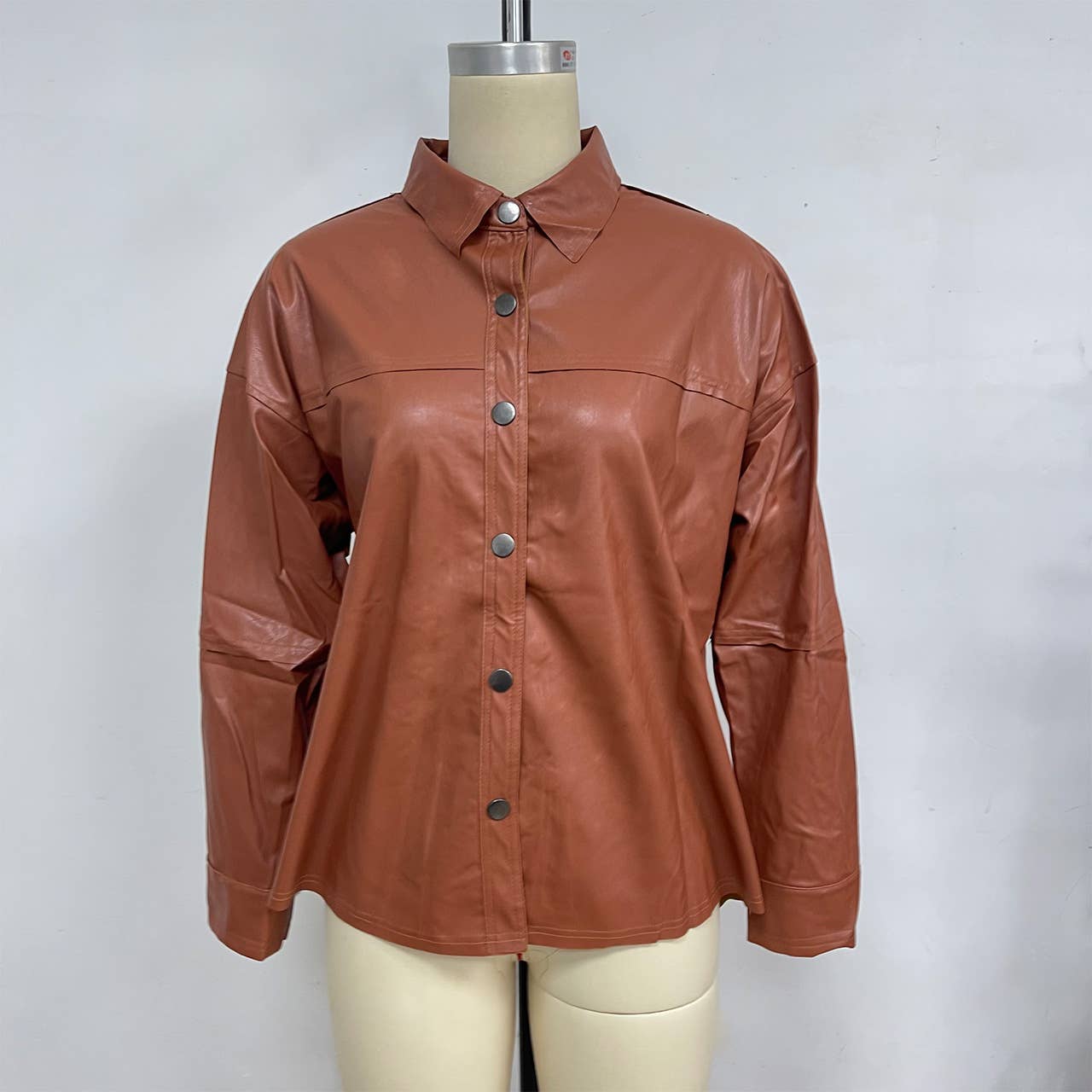 Lapel solid-color long-sleeved leather jacket